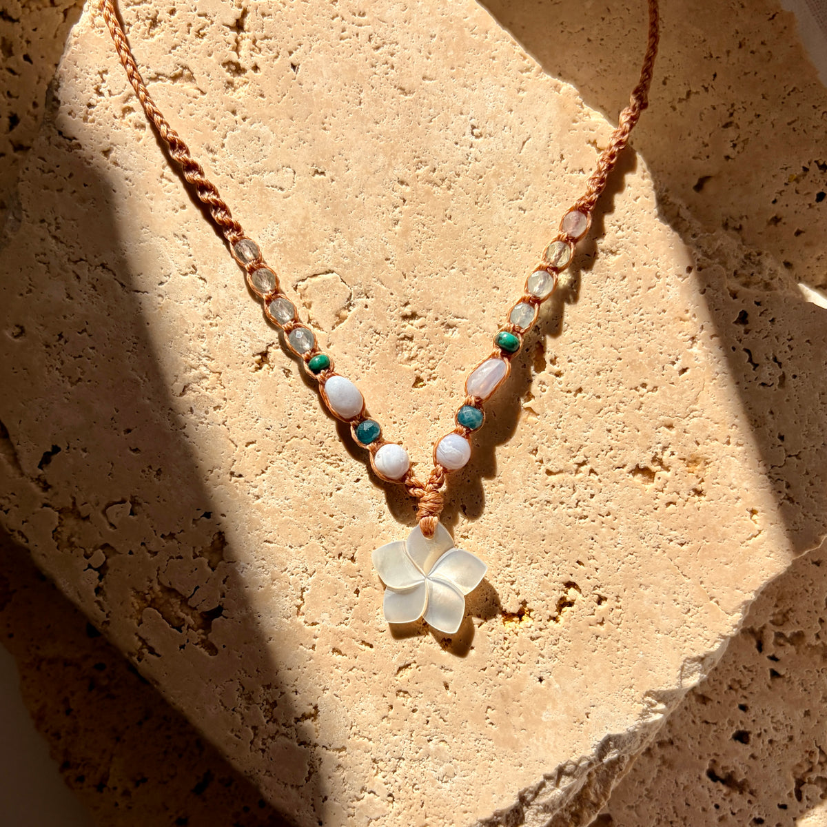 Mother of Pearl frangipani macrame necklace